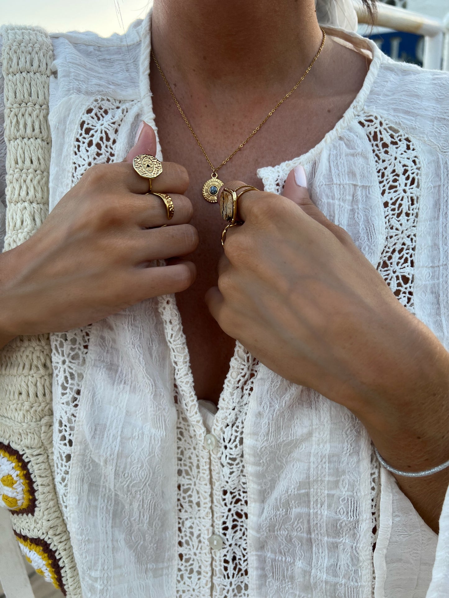 Collar Garbet y anillos Port Blau, Sa Caleta y Torre Valentina de acero inoxidable. 